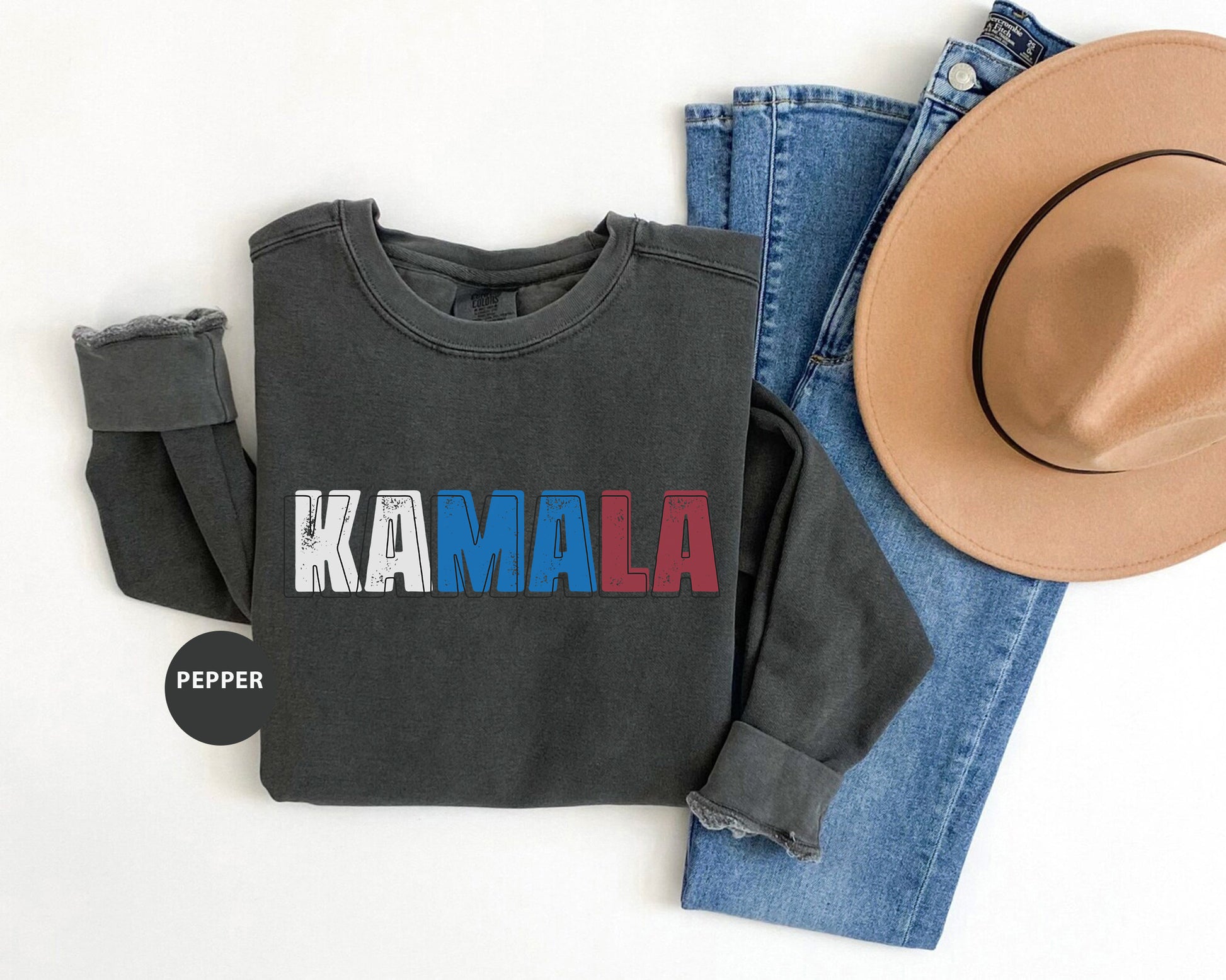 a hat, jeans, and a sweatshirt with the word maala printed on it