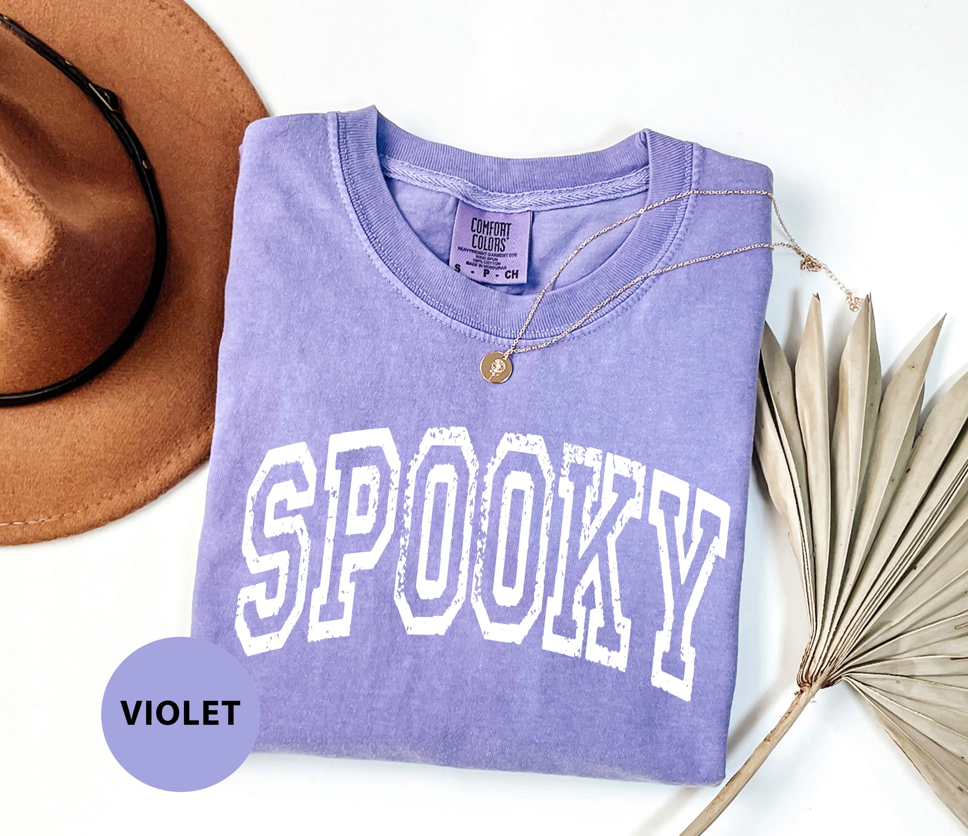 a purple shirt with the word spooky on it