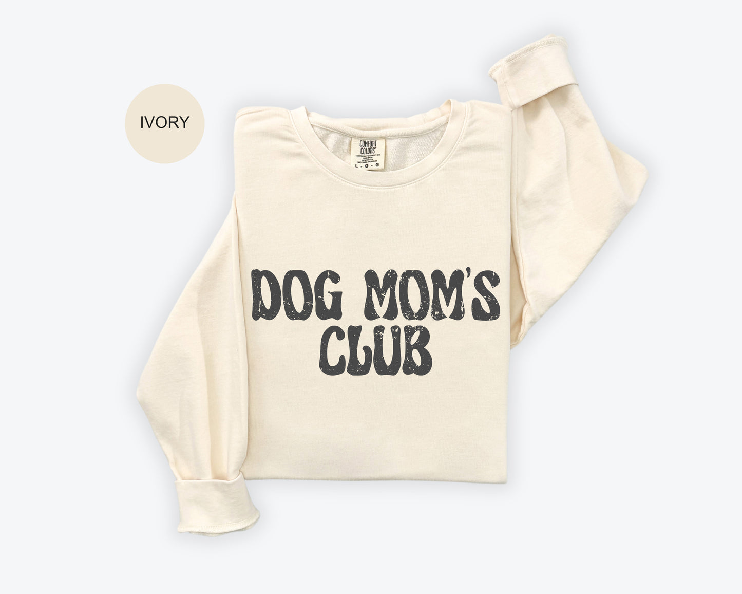 a dog mom's club sweatshirt with the words dog mom's club on