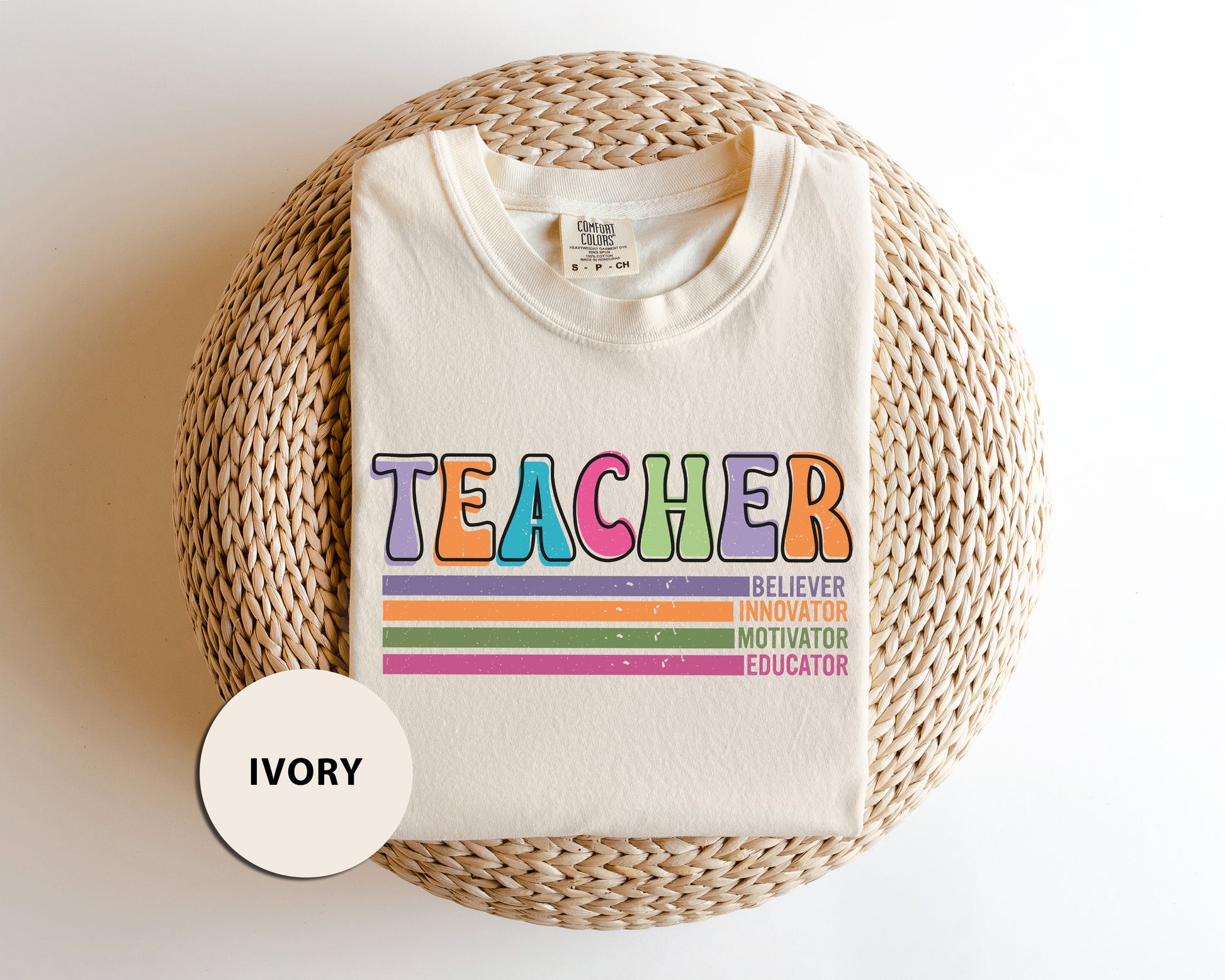 a t - shirt that says teacher on it