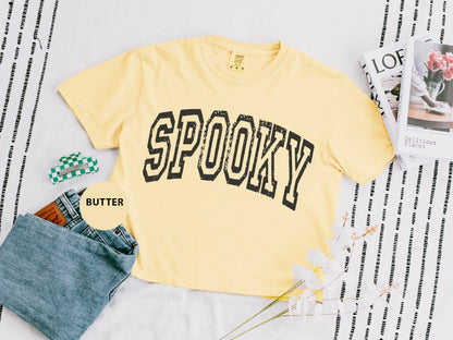 a yellow shirt with the word spooky on it