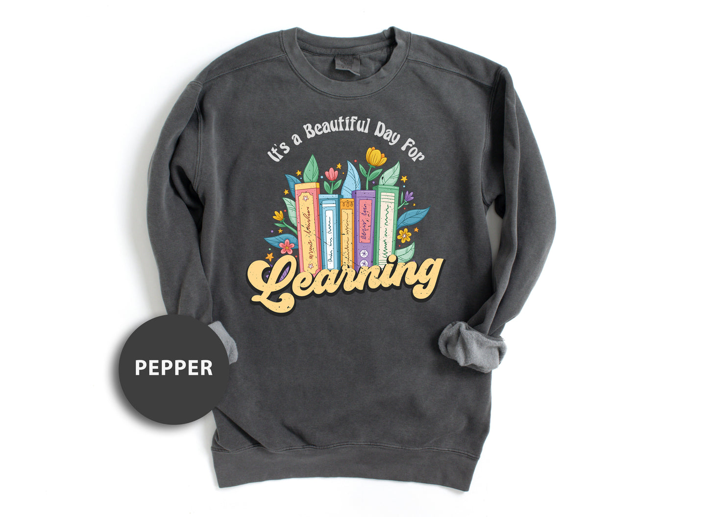 a black sweatshirt with the words learning printed on it