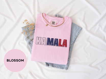 a pink t - shirt with the word kaamala on it