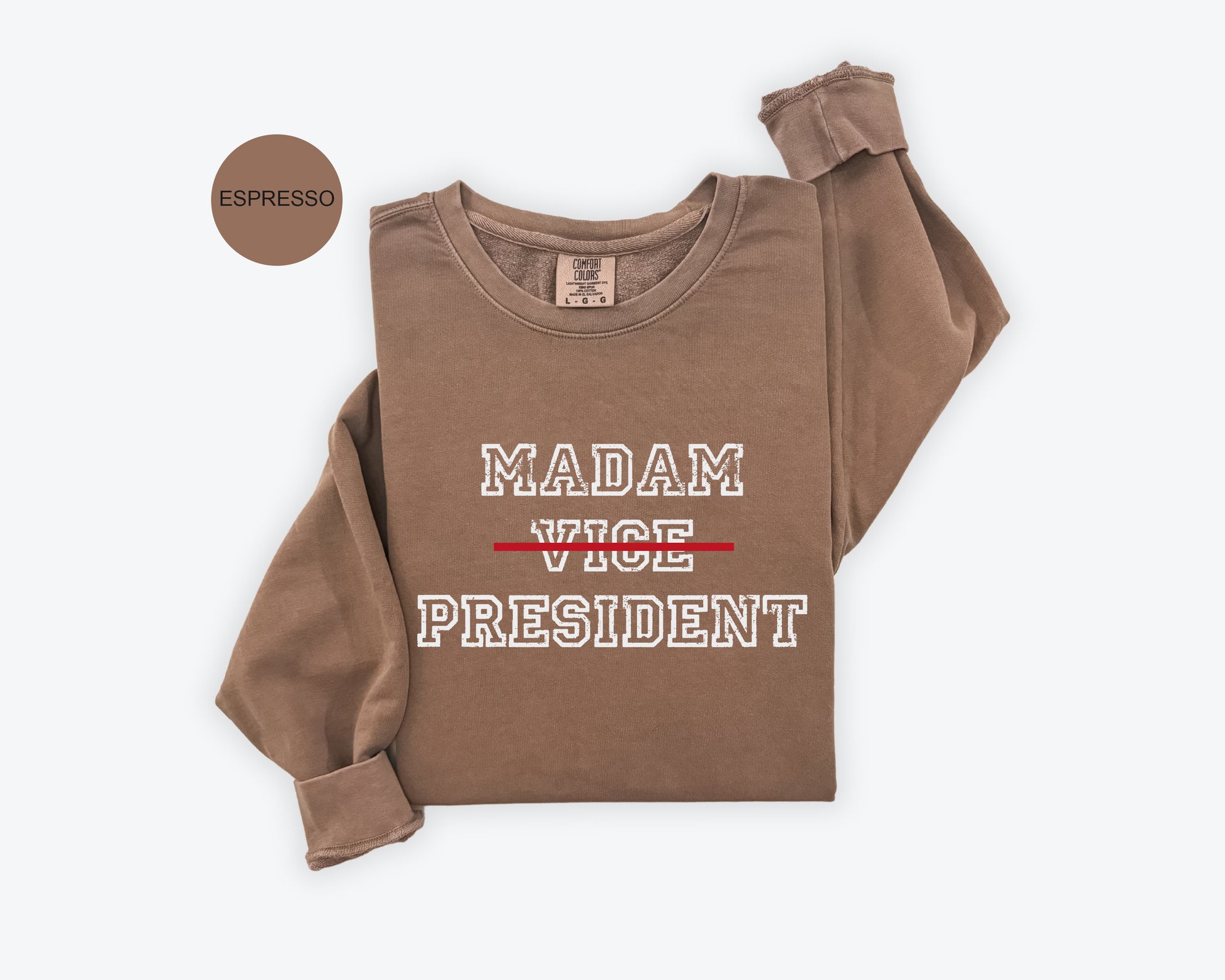 a brown shirt with the words madam, vice and president printed on it