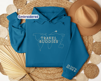 a blue hoodie with the words travel buddies printed on it