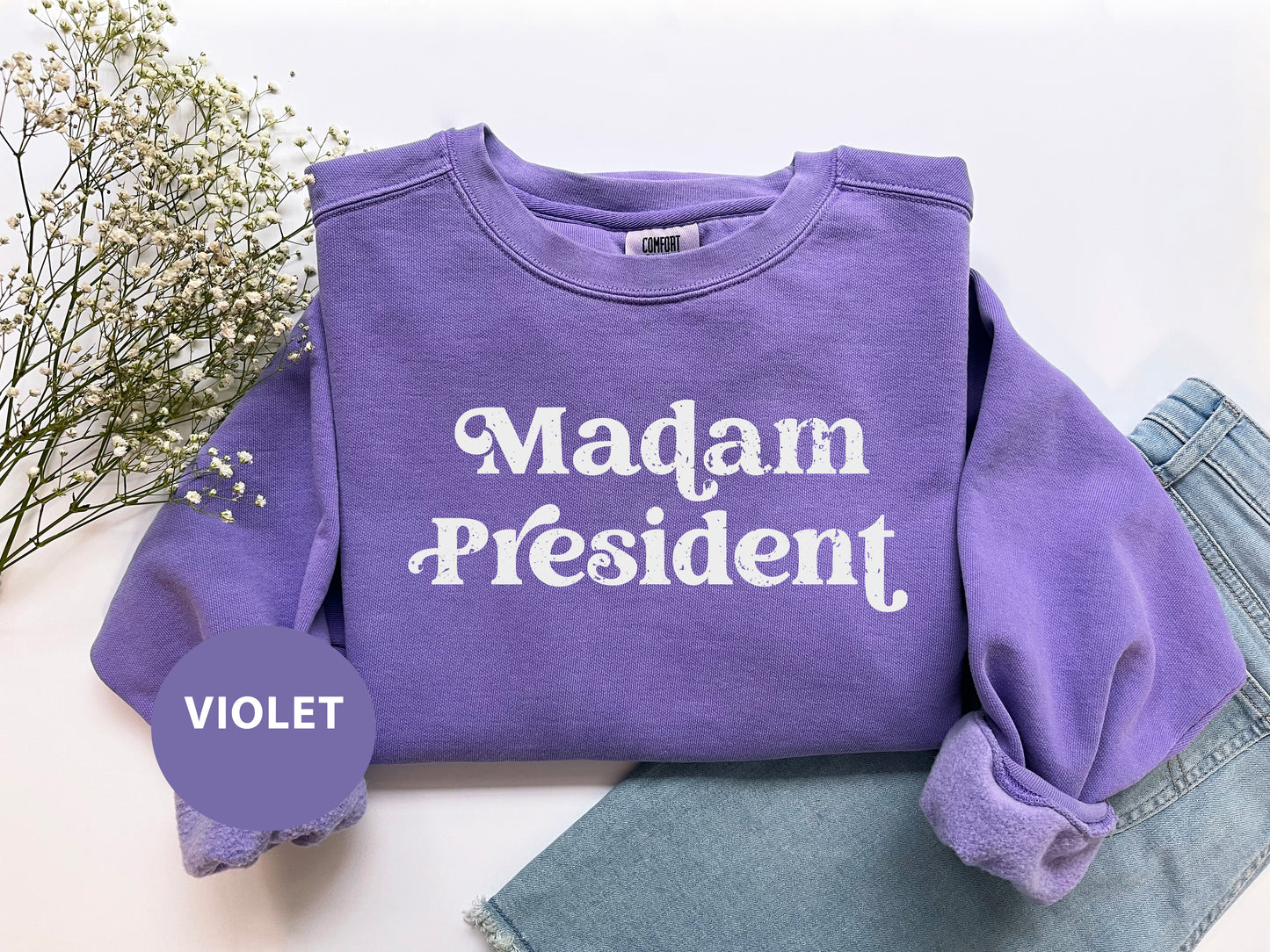 a purple shirt with the words madam president on it