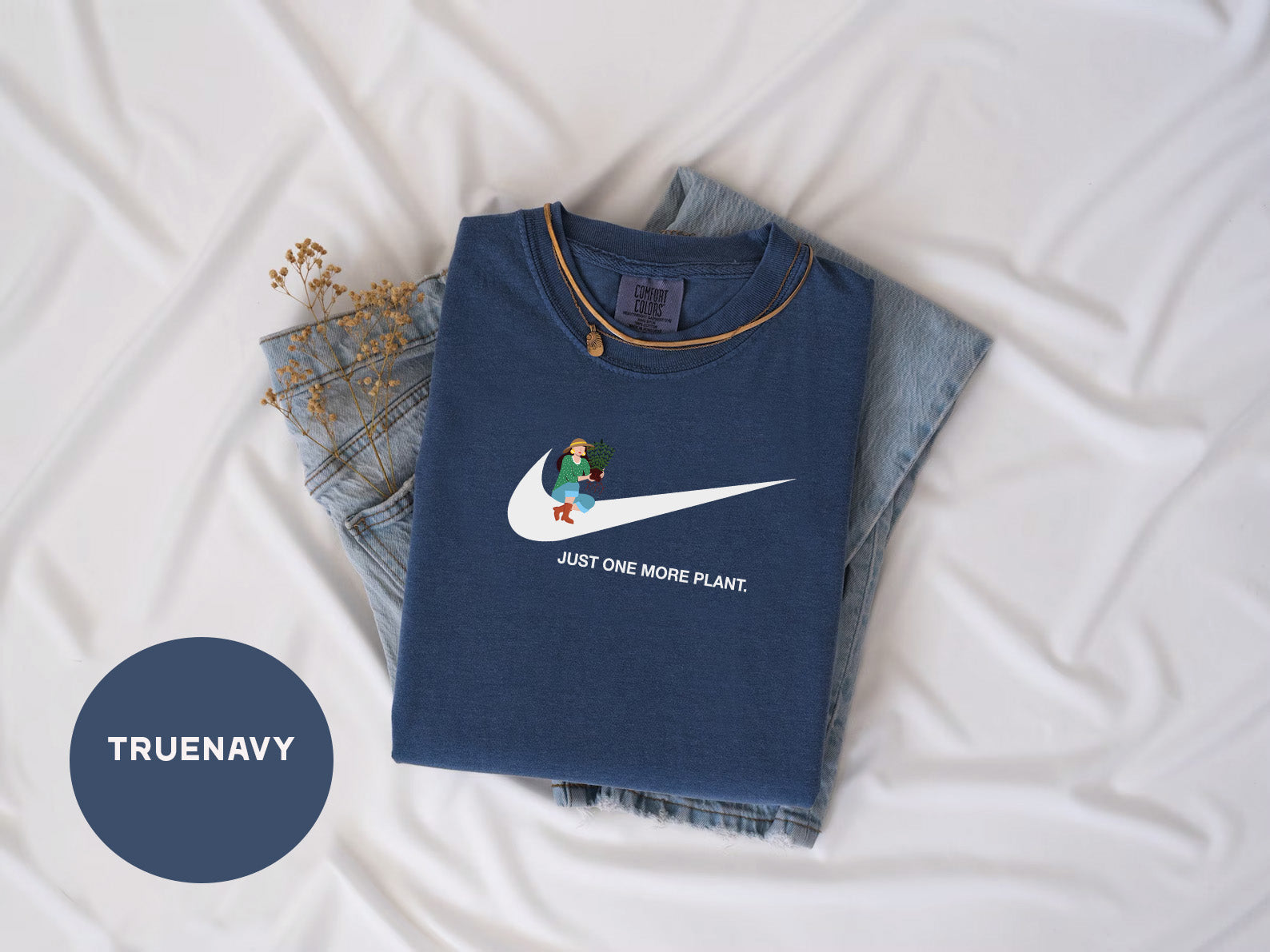 a pair of blue jeans and a blue nike t - shirt