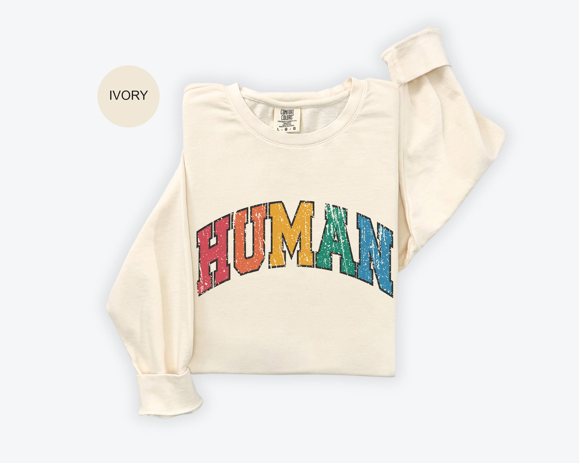 a white shirt with the word human printed on it