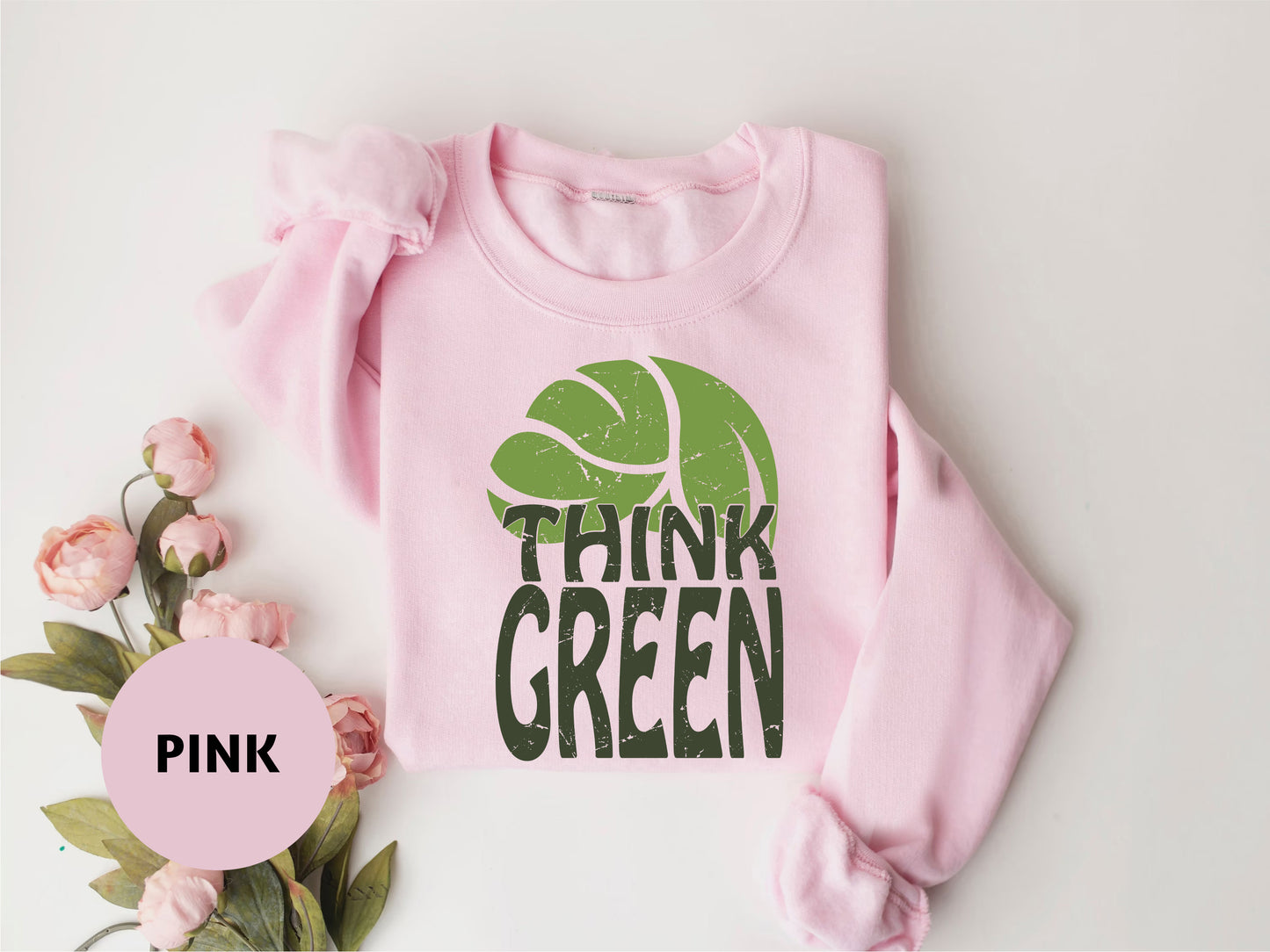 a pink shirt with the words think green on it