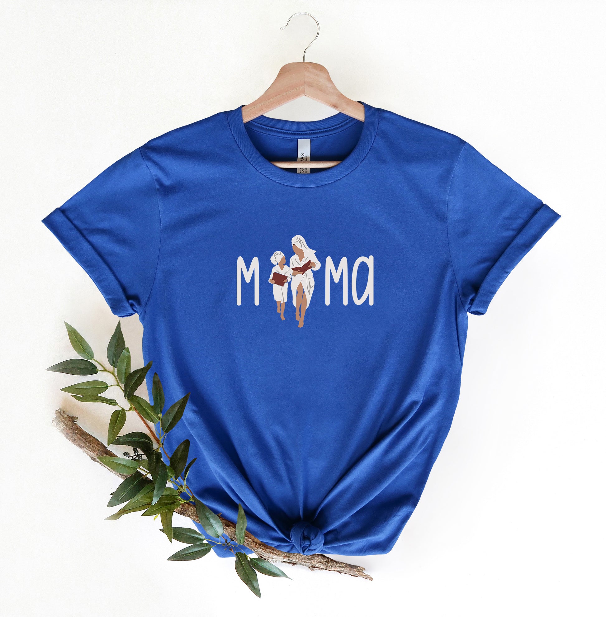 a blue t - shirt with the word mom on it