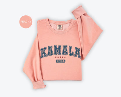 a pink sweatshirt with the word kalamala printed on it