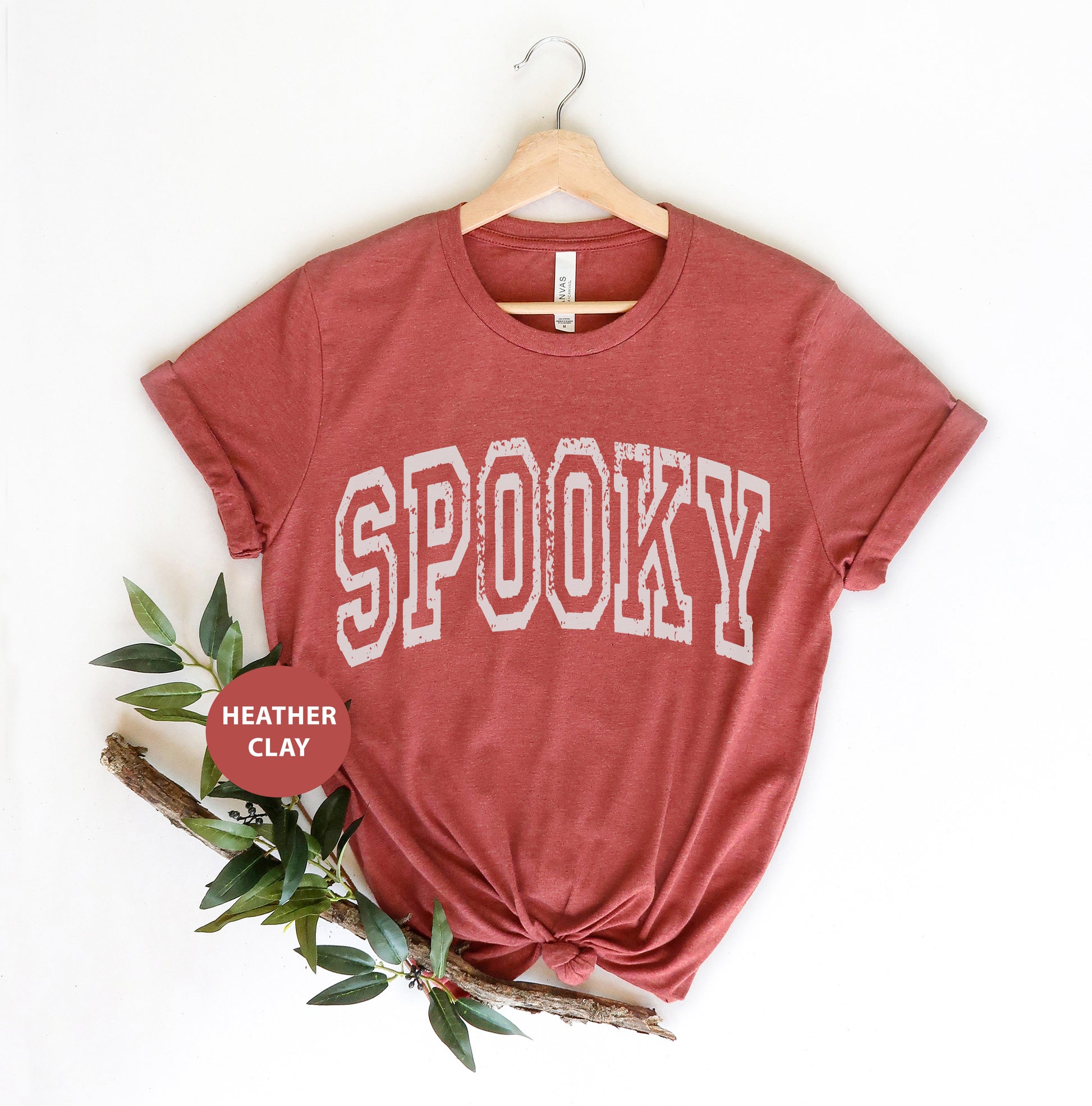 a red shirt with the word spooky on it