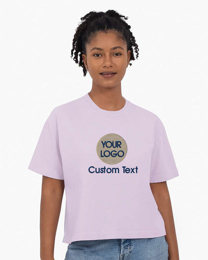 a woman wearing a purple t - shirt with the words your logo on it