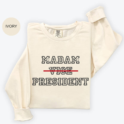 a white sweatshirt with the words madam vice president printed on it