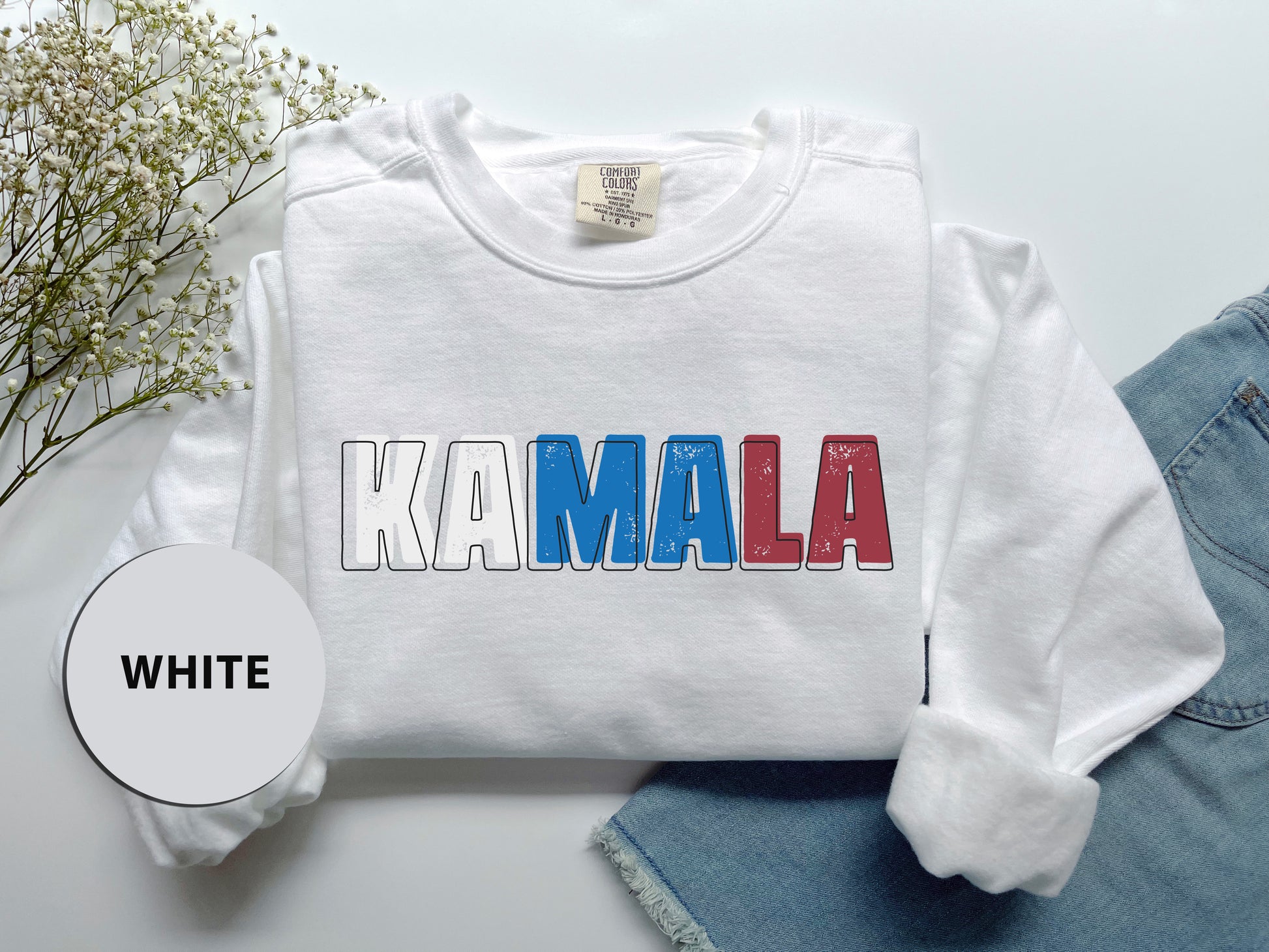 a white shirt with the word kalaana printed on it