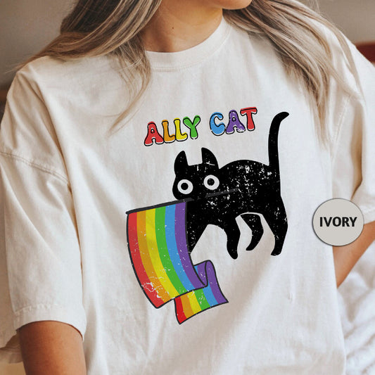 a woman wearing a white shirt with a black cat on it