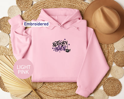 a pink hoodie with the words spooky pink on it