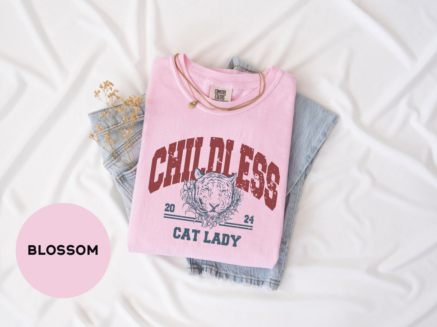 a pink shirt that says, children's cat lady