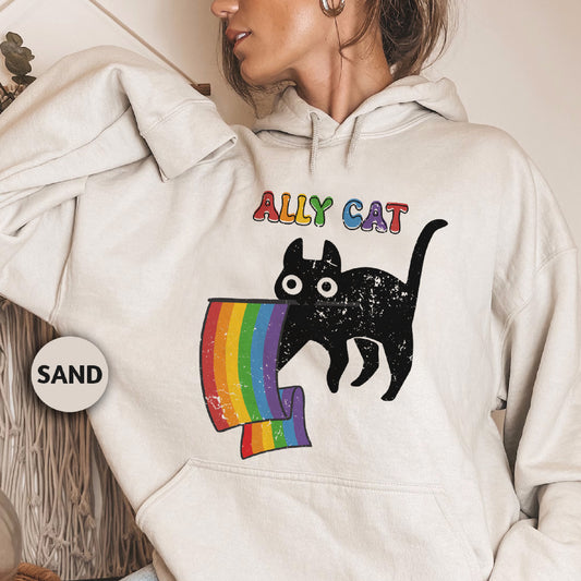 a woman wearing a white hoodie with a black cat on it