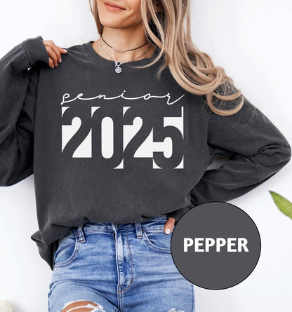 a woman wearing a black sweatshirt with the words peper printed on it