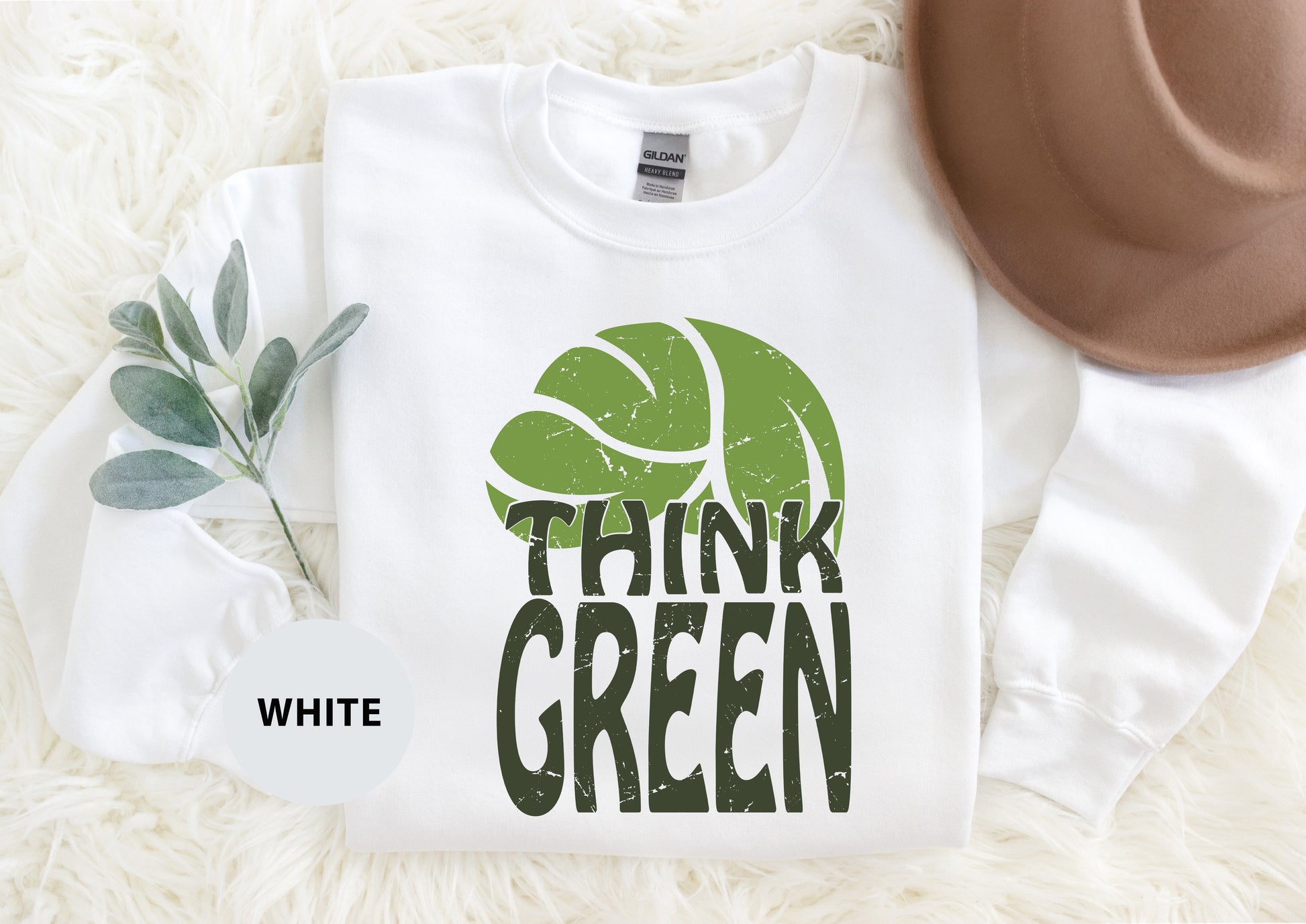 a t - shirt with the words think green printed on it