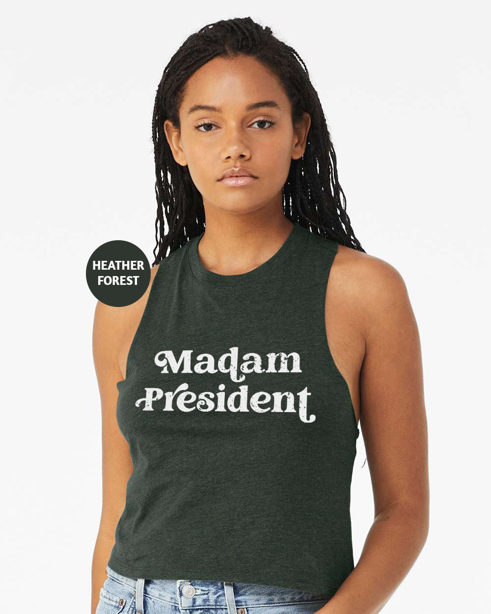 a woman wearing a tank top that says madam president