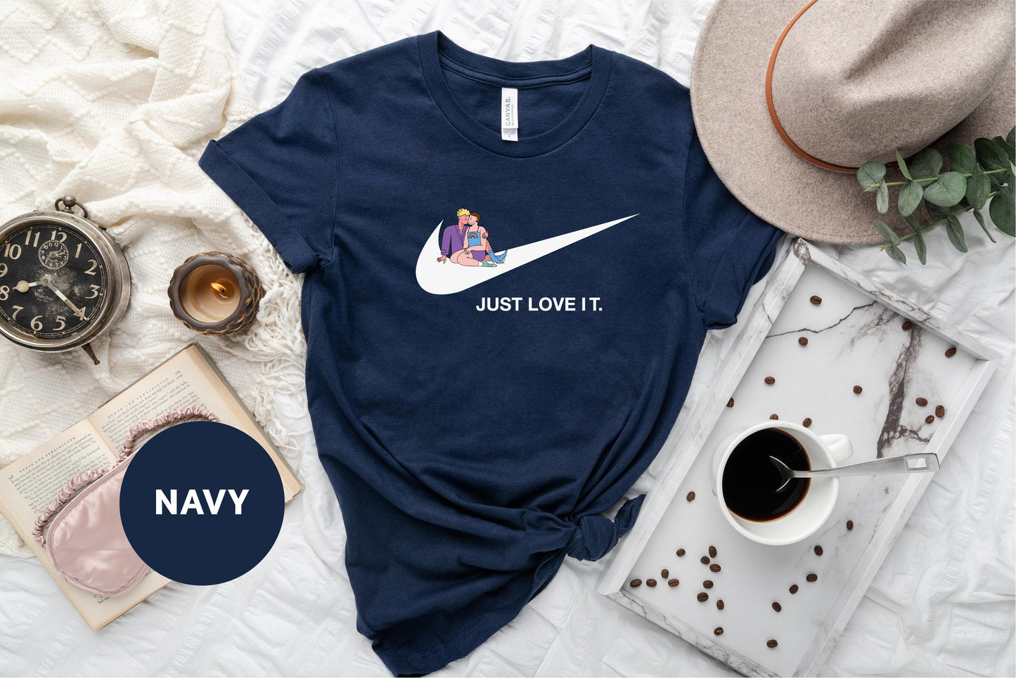 a navy t - shirt that says just love it with a picture of a woman