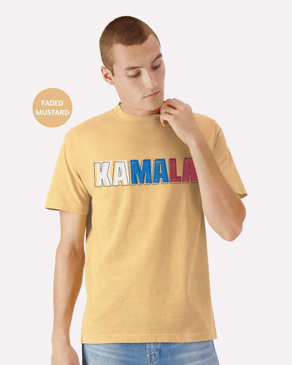 a young man wearing a yellow shirt with the word kalamala printed on it