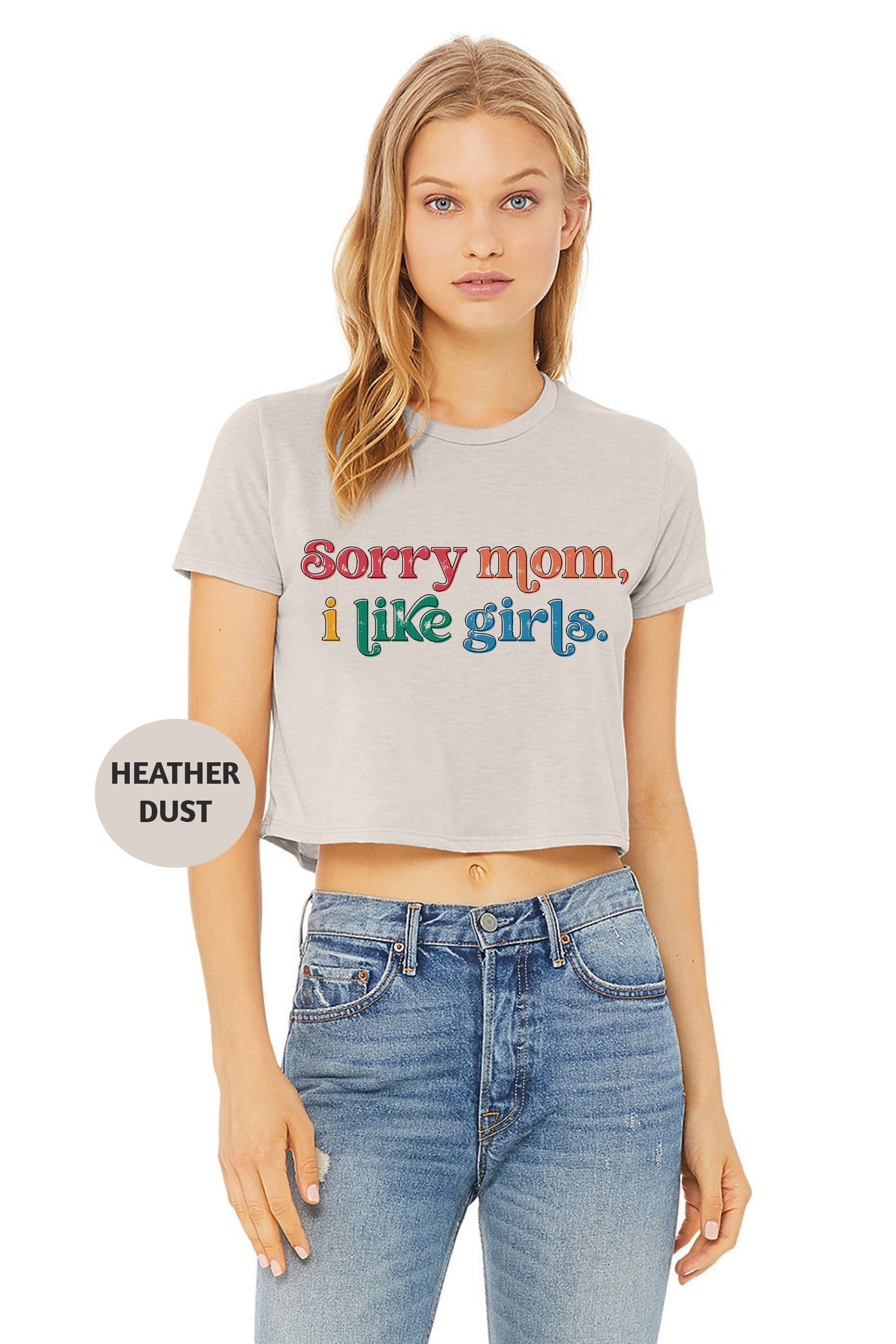 a woman wearing a t - shirt that says sorry mom, i like girls