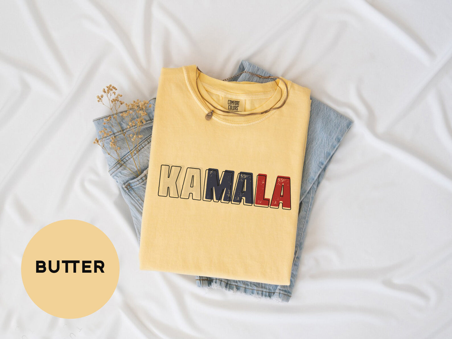 a yellow shirt with the word mama printed on it