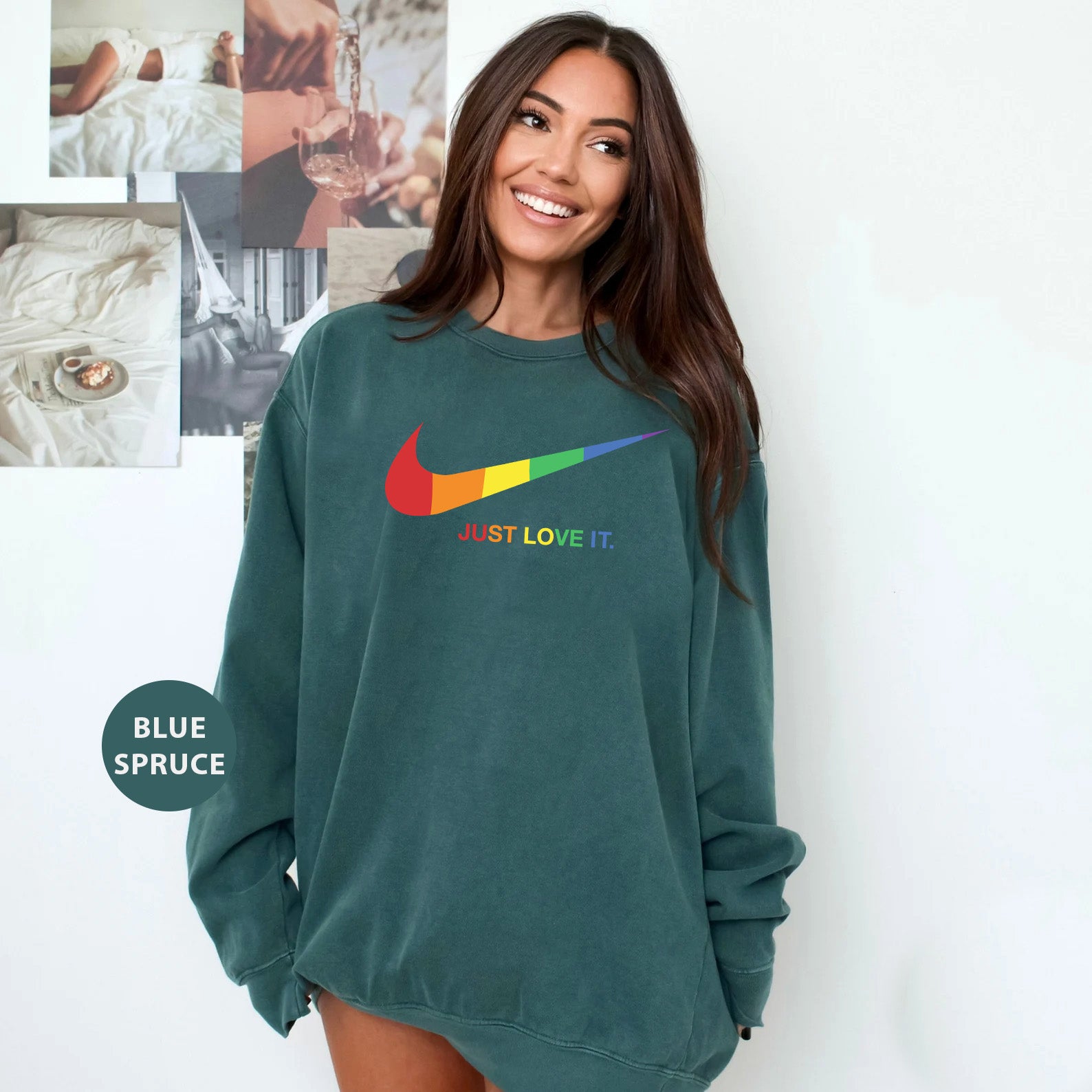 a woman wearing a green sweatshirt with a colorful nike logo on it