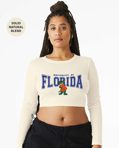 a woman wearing a white crop top with the word florida printed on it