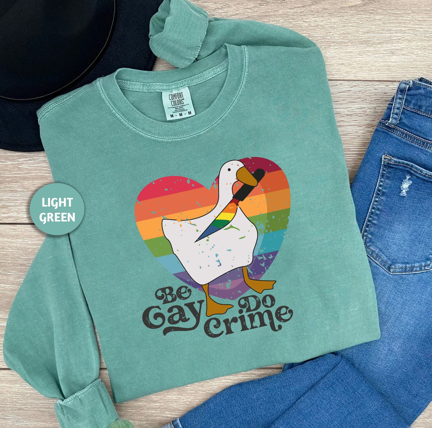 a shirt that says be gay do crime with a duck on it