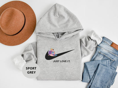 a hat, sweatshirt, jeans, and a pair of shoes