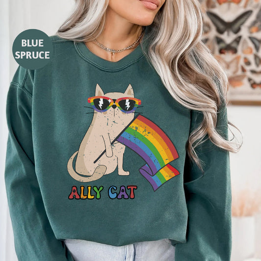 a woman wearing a sweatshirt with a cat on it