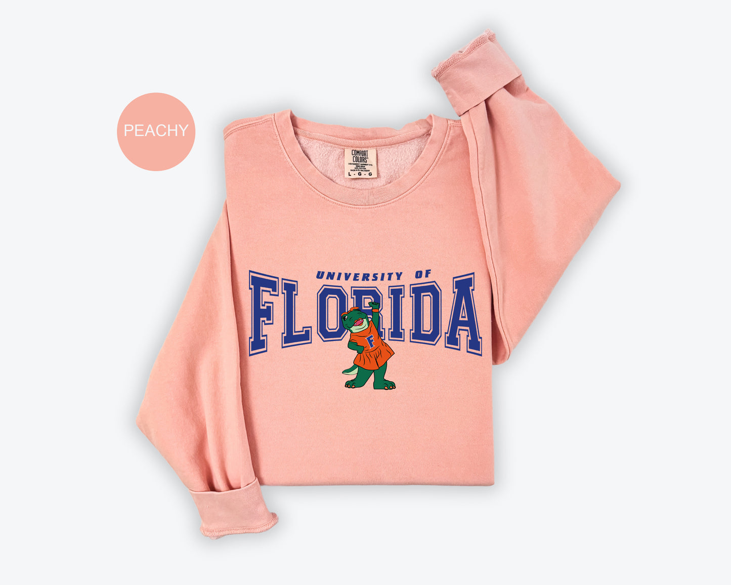 a pink shirt with the words university of florida on it