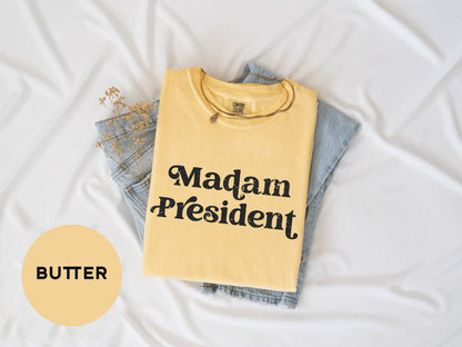 a yellow shirt that says madam president on it