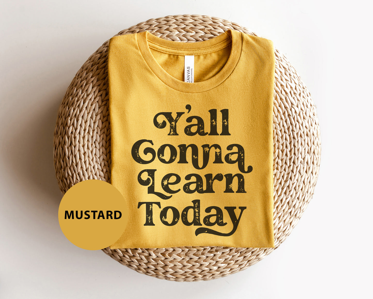 a yellow shirt that says y'all goma learn today