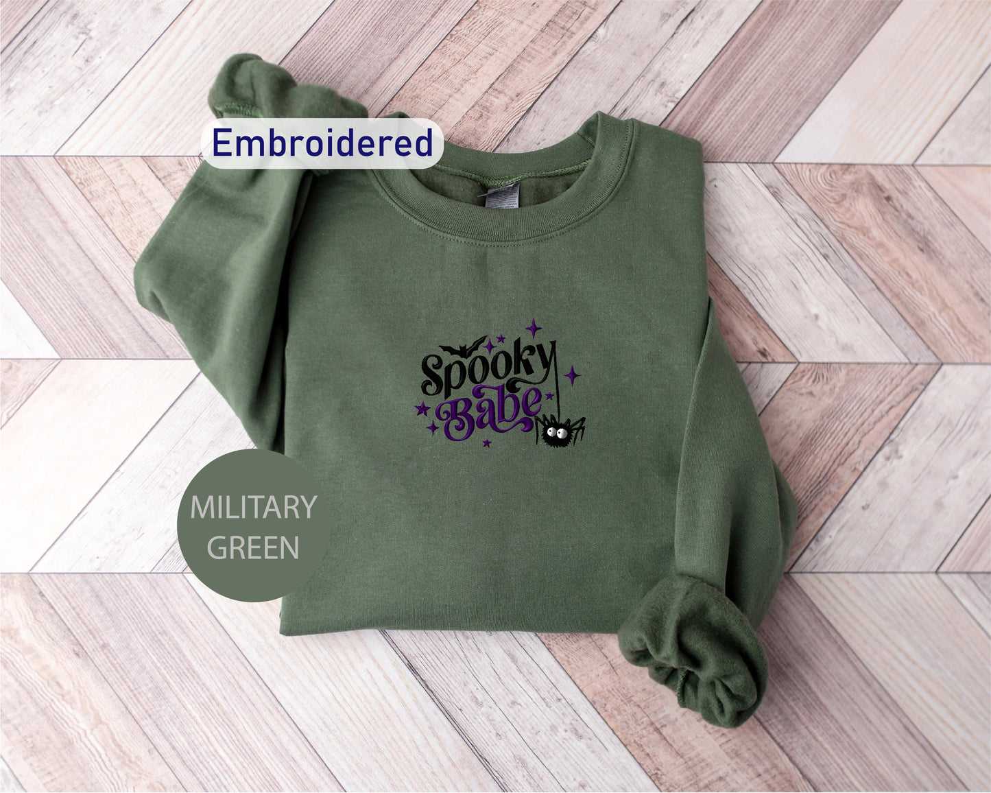 a green sweatshirt with the words spooky girl on it