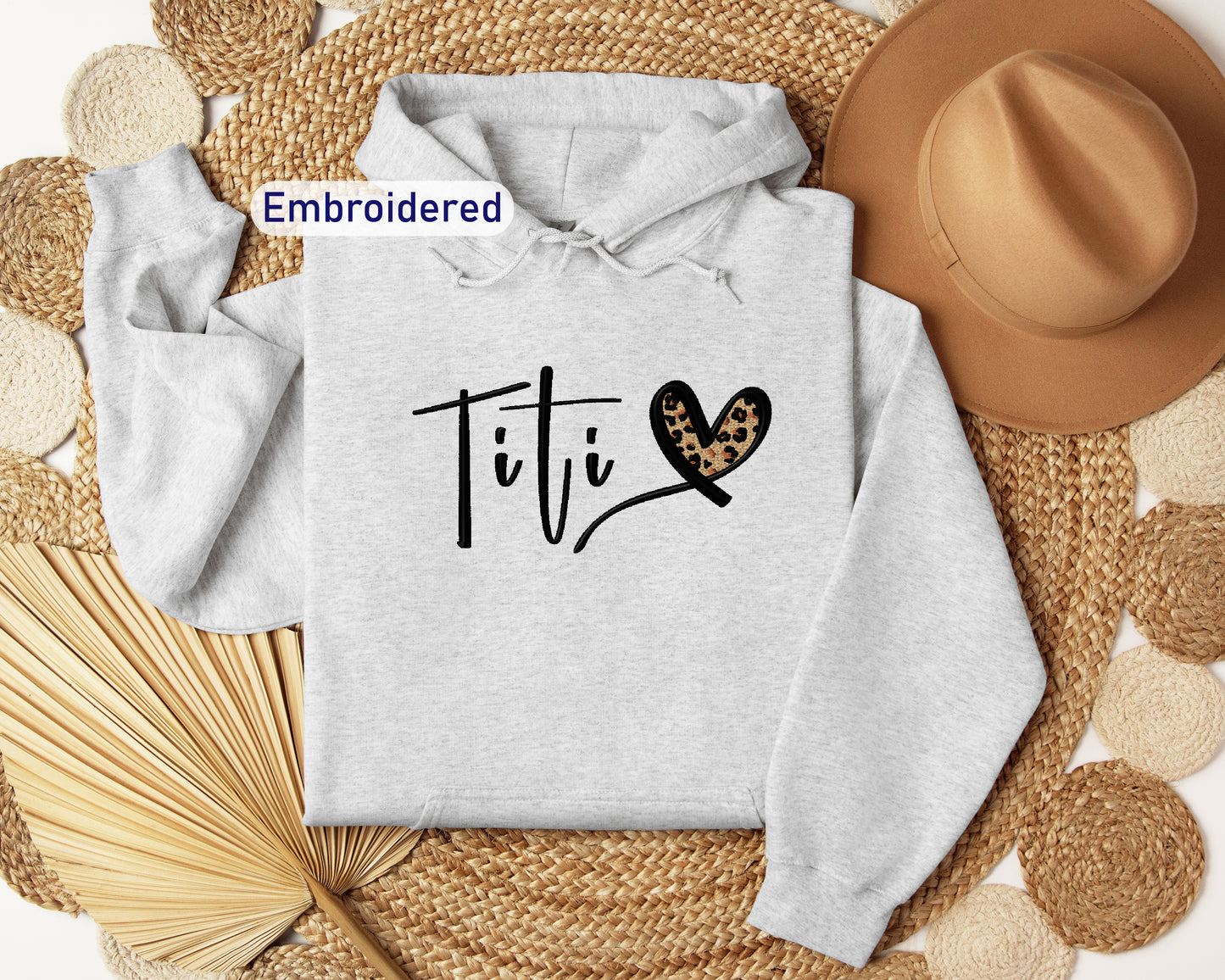 a hoodie with the word titi written on it