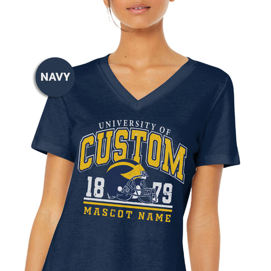 a woman wearing a navy shirt with a football helmet on it