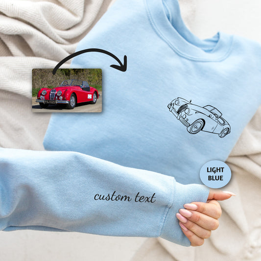 a person wearing a blue shirt with a picture of a car on it