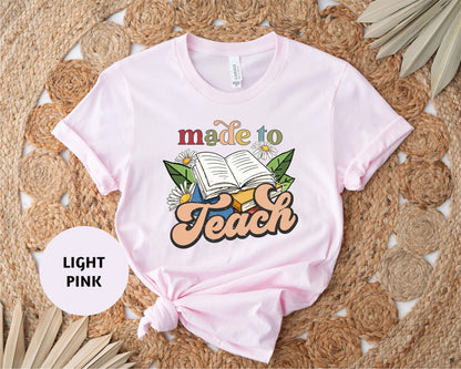 a pink t - shirt with the words made to teach on it