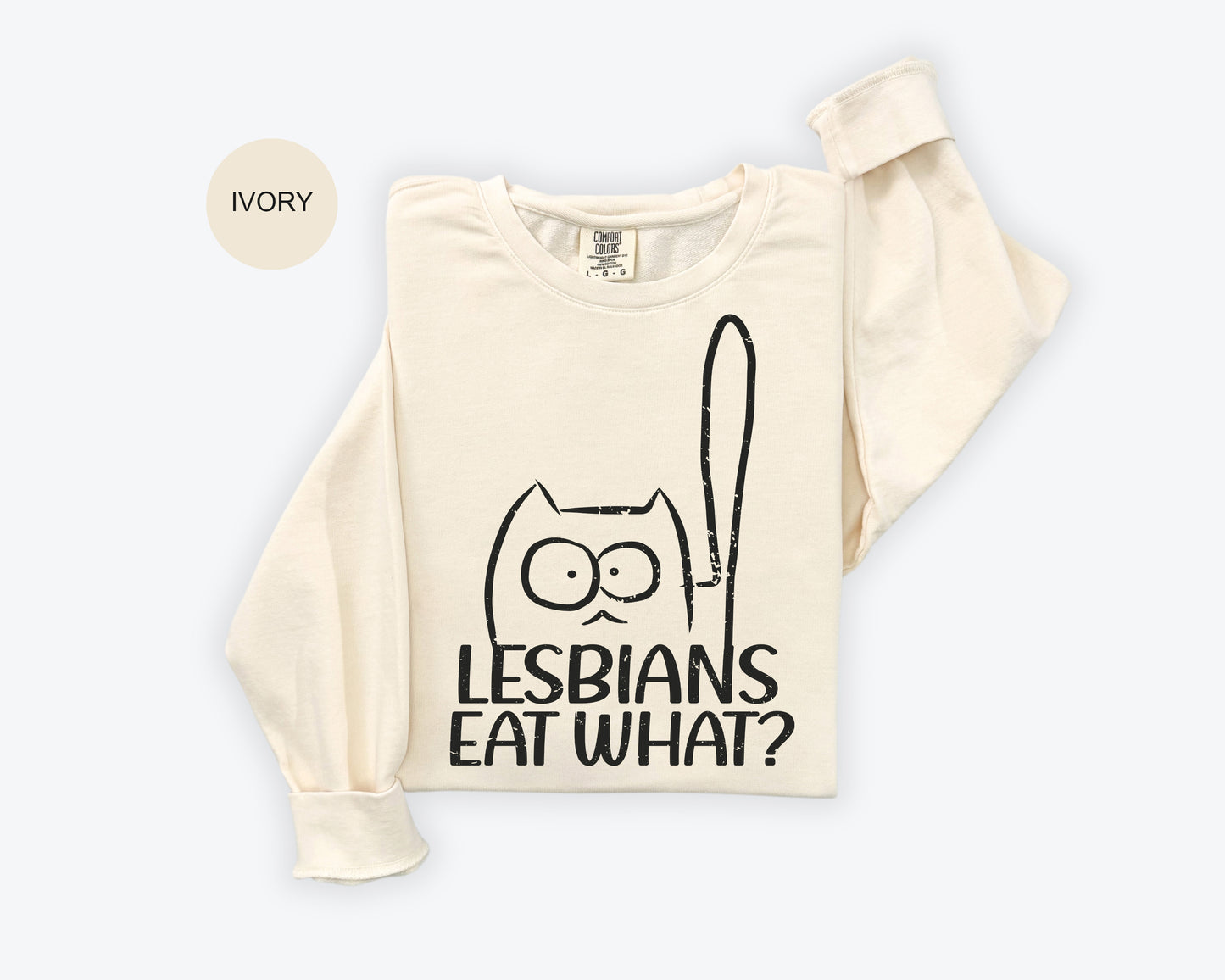 a white t - shirt with a black cat on it that says lesbians eat