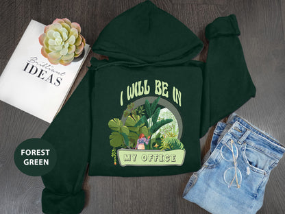 a green hoodie with a picture of a potted plant on it