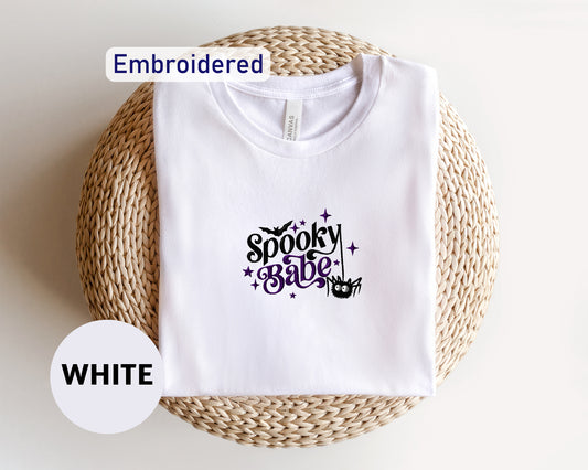 a white t - shirt with the words spooky sale on it