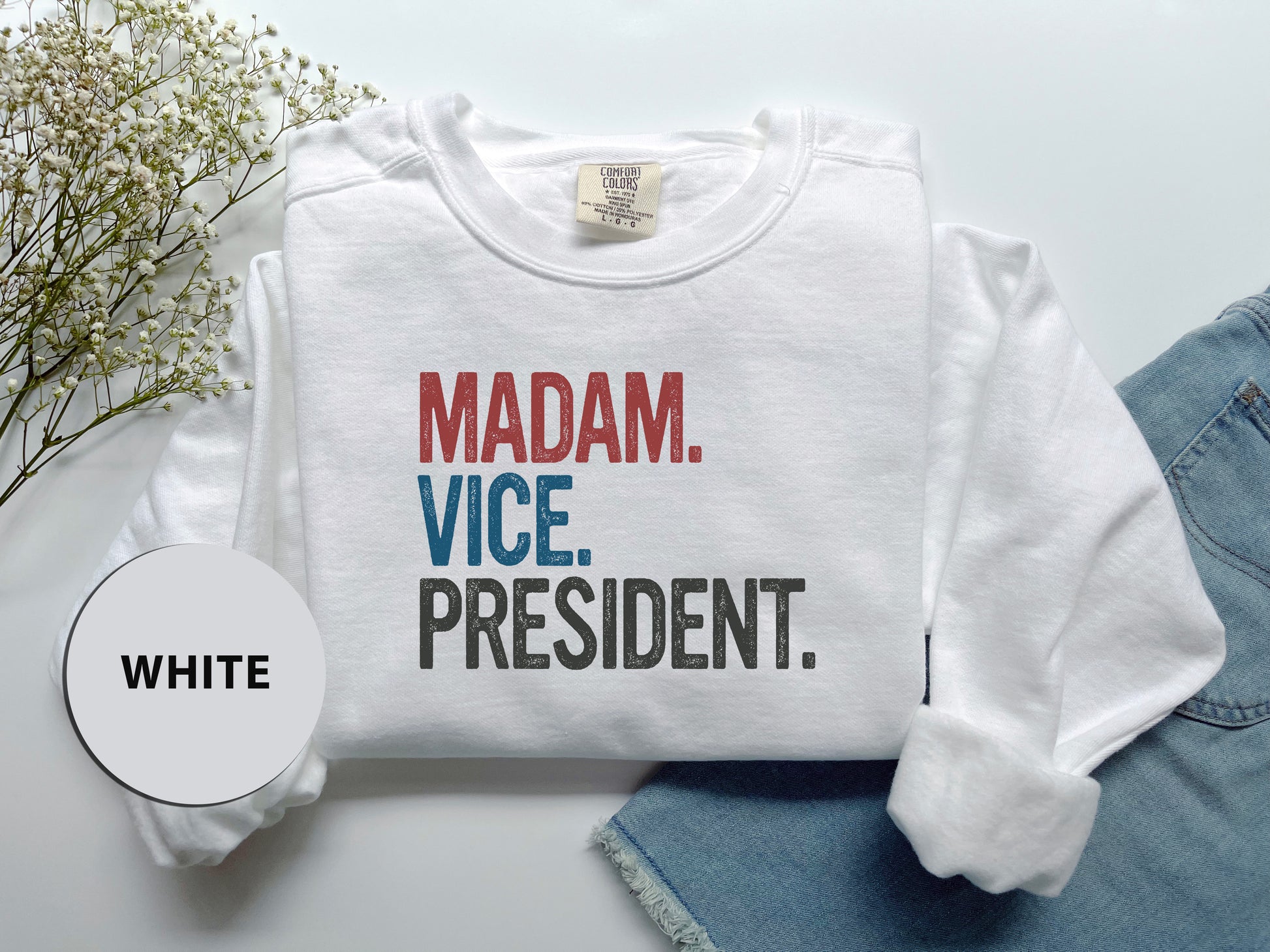 a white shirt with the words madam vice president on it