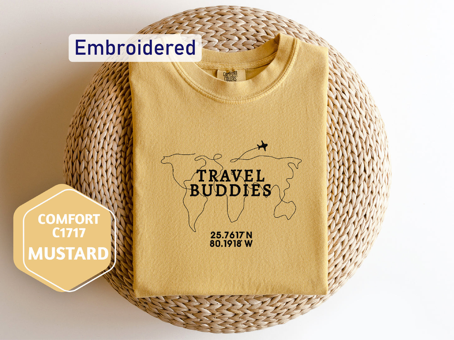 a yellow t - shirt with a map of the world printed on it