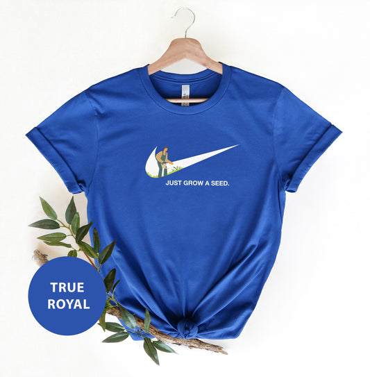 a blue t - shirt with a white nike logo on it