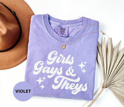 a t - shirt that says girls, gays and theys next to a
